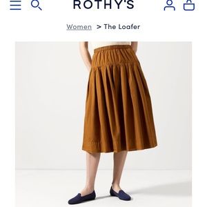 Navy blue Rothy’s loafers.